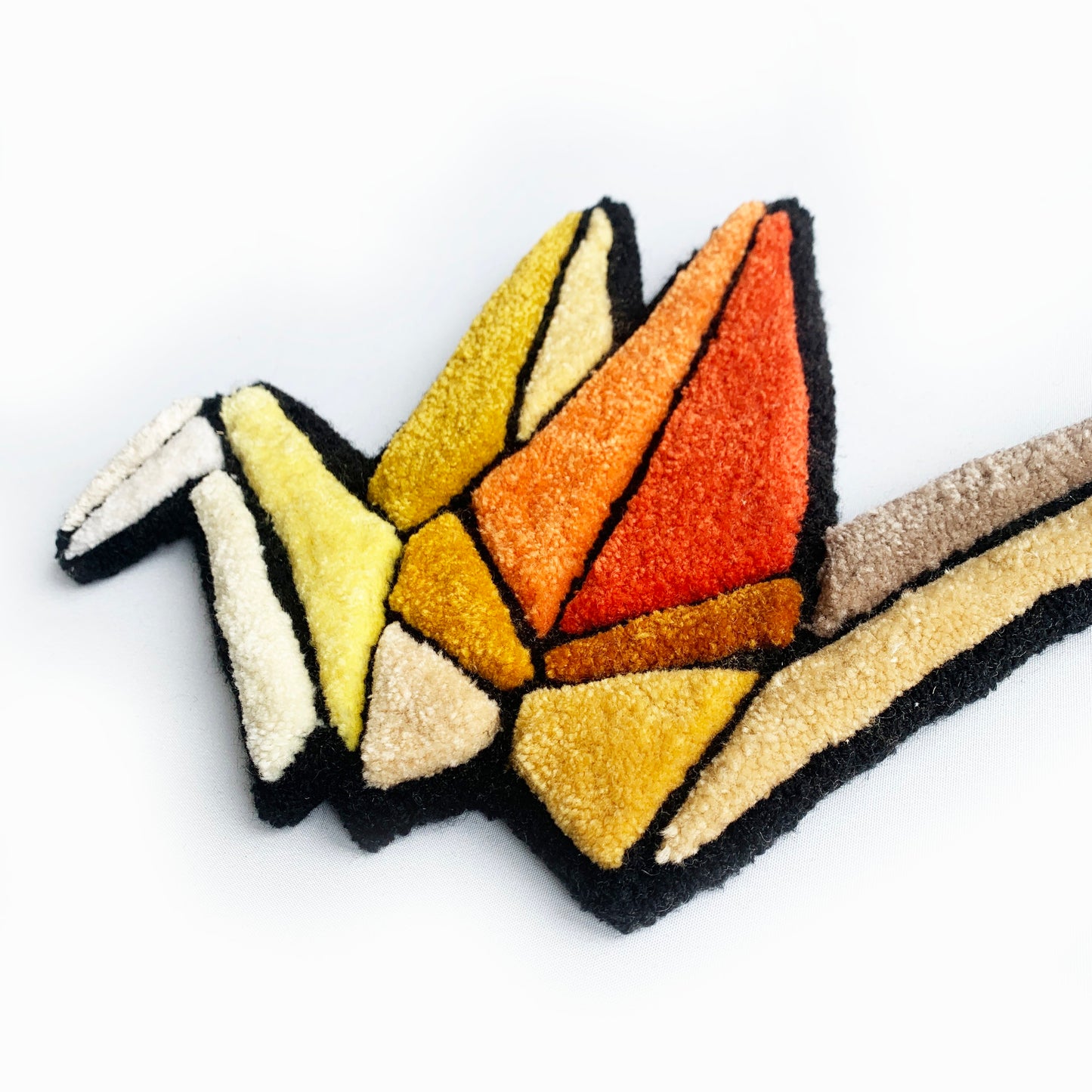 Origami crane yellow tones